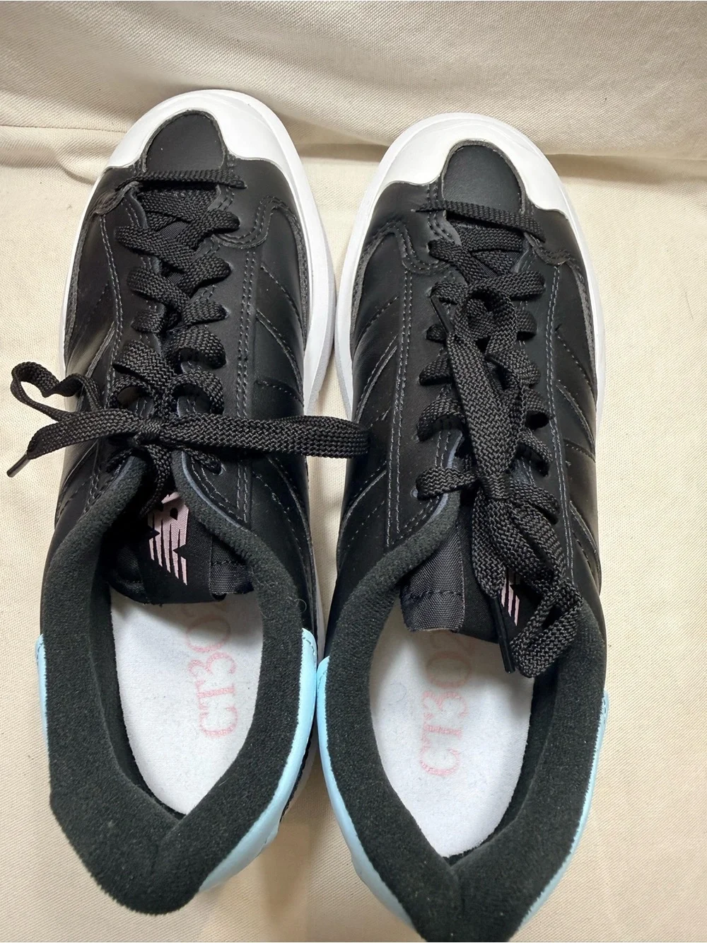 New Balance - Black and White Women's Leather Sneakers with Light Blue Accent